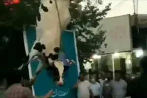 فیلم آویزان کردن یک گاو از پا در ستاد انتخاباتی سیرجان