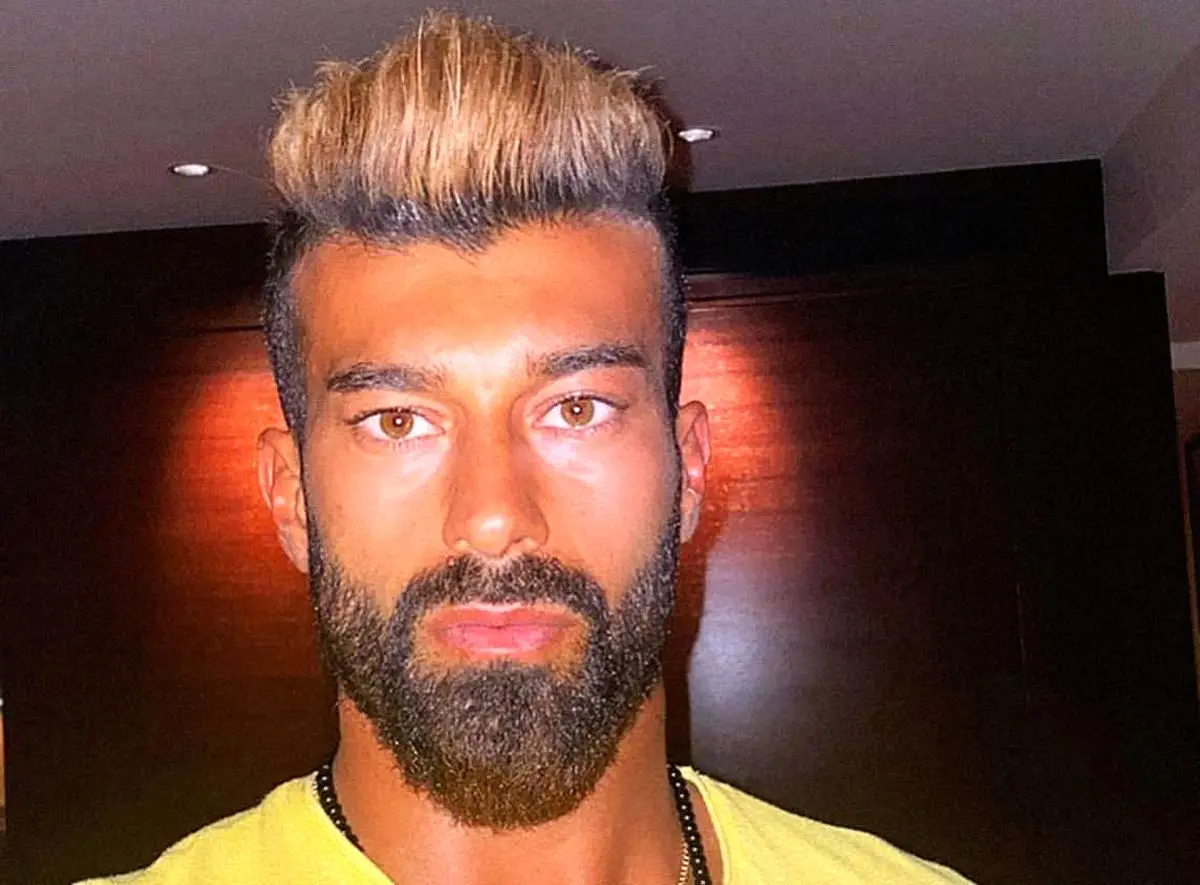 عکس لو رفته از بازیکن پرسپولیس با لباس‌های منشوری در خارج! + عکس